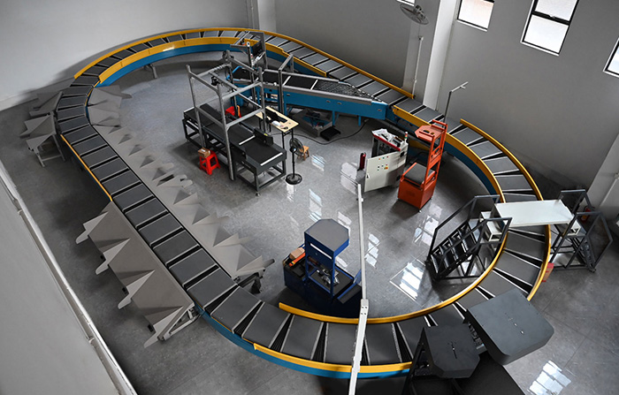 環(huán)型交叉帶分揀機的工作原理、特點及應(yīng)用